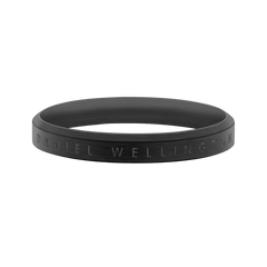 Classic Ring Black featuring a brushed stainless steel band with Daniel Wellington engraved branding, showcasing its minimalist design and deep black finish suitable for both men and women.