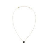 Gold necklace with an adjustable chain featuring a domed black agate pendant encircled by white cubic zirconia crystals, designed for a refined and modern look.