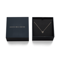 Crystal Zodiac Chain Necklace Gold with a Taurus pendant set with sparkling crystals, presented in an elegant Daniel Wellington gift box.