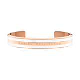 Emalie Bracelet Satin White Rose Gold features a sleek open cuff design with satin white enamel and rose gold plating, engraved with the Daniel Wellington logo for a modern, elegant look.
