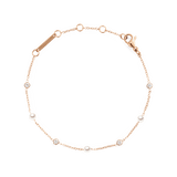 Delicate rose gold bracelet featuring alternating Swarovski glass pearls and cubic zirconia stones on a fine chain, designed with an adjustable clasp for a comfortable fit.