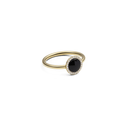 Gold ring featuring a slim band with a domed black agate centrepiece, encircled by a halo of white cubic zirconia crystals for a refined and elegant look.