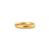 A polished gold band ring with a softly rounded profile, the Arch Ring Gold 3.5mm features a minimalist design and smooth finish, ideal for stacking or wearing on its own.