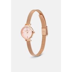 Petite Mini Blush Melrose watch with a blush pink sunray dial, petite 19mm rose gold case, and an adjustable rose gold mesh strap, shown at an angle to highlight its refined and lightweight design.