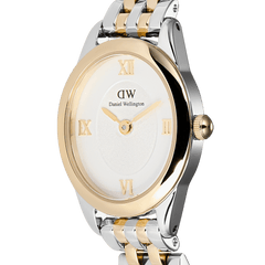 Close-up of the Ophelia Mini Two Tone Gold watch showing the oval gold bezel, white dial with gold Roman numerals, and polished gold and silver bracelet links.