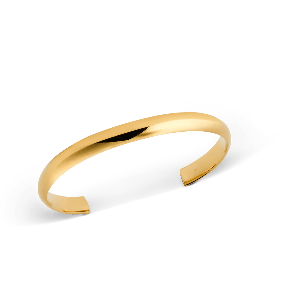 Arch Cuff Gold 6mm shown at an angle, highlighting its polished gold finish, minimalist curved silhouette and open-ended design for easy adjustment.