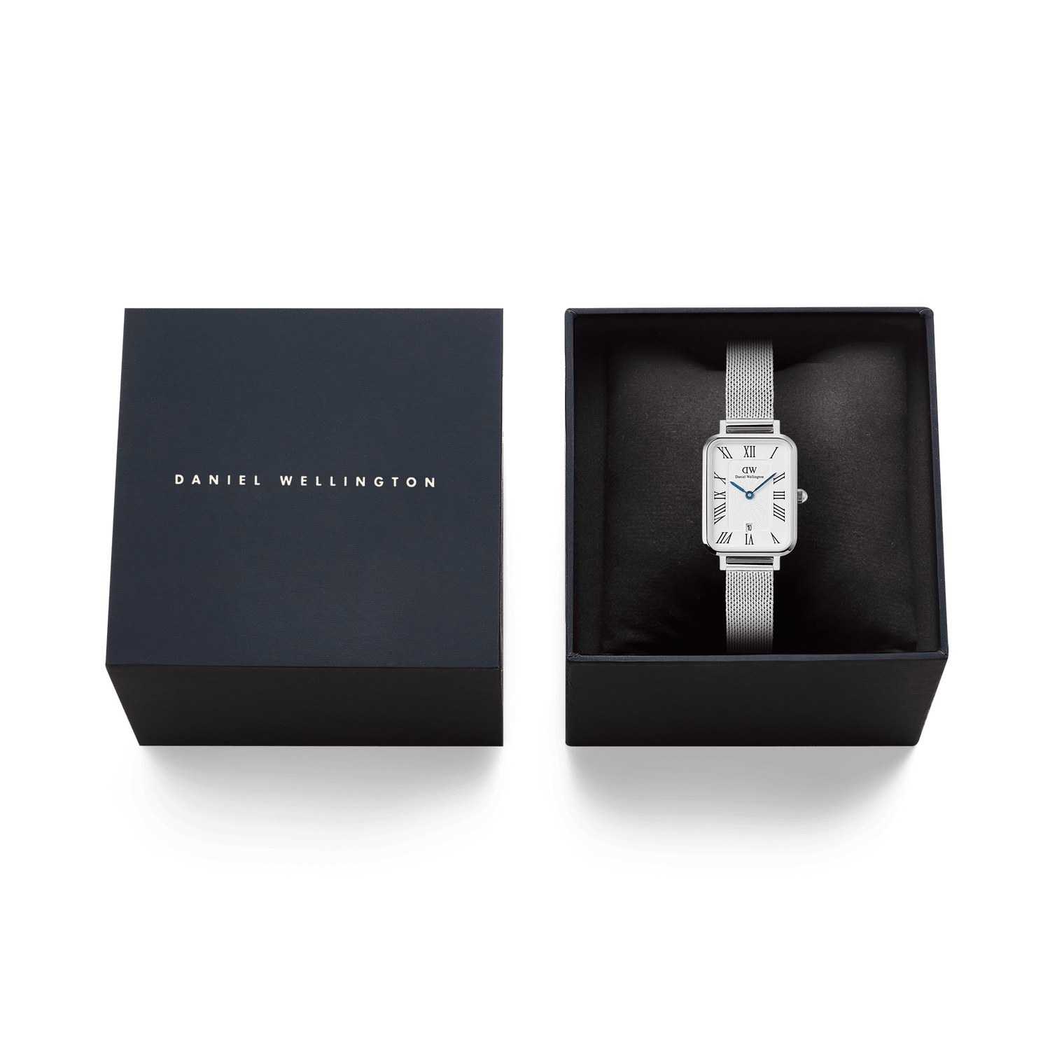 Quadro Sterling Roman Numerals Date ladies watch with a rectangular silver mesh strap, presented in a black Daniel Wellington gift box, highlighting its elegant packaging for gifting or special occasions.