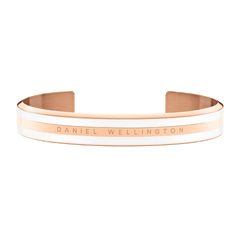 Rose gold and satin white enamel cuff bracelet with Daniel Wellington branding, featuring a slim, modern silhouette ideal for layering or wearing solo.