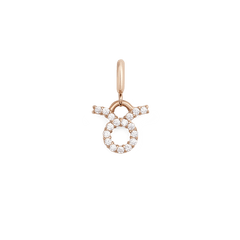 Rose gold Taurus zodiac watch charm with cubic zirconia crystals, featuring a minimalist design suitable for Daniel Wellington watches and bracelets.