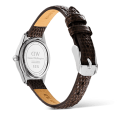 Rear view of the Ophelia Mini Dark Brown Lizard White Guilloché Silver watch, showing the engraved stainless steel case back, textured brown lizard-embossed leather strap, and polished silver pin buckle.