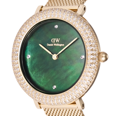 Close-up of the Crystalline Bezel Evergold Green gold ladies watch, highlighting the emerald green mother of pearl dial, crystal-set bezel, and gold mesh strap for an elegant, refined finish.