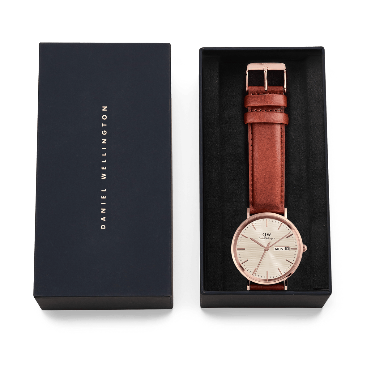 Classic Day Display St Mawes Rose Gold Champagne men's watch with a champagne dial, rose gold case, and brown leather strap, presented in a Daniel Wellington gift box.