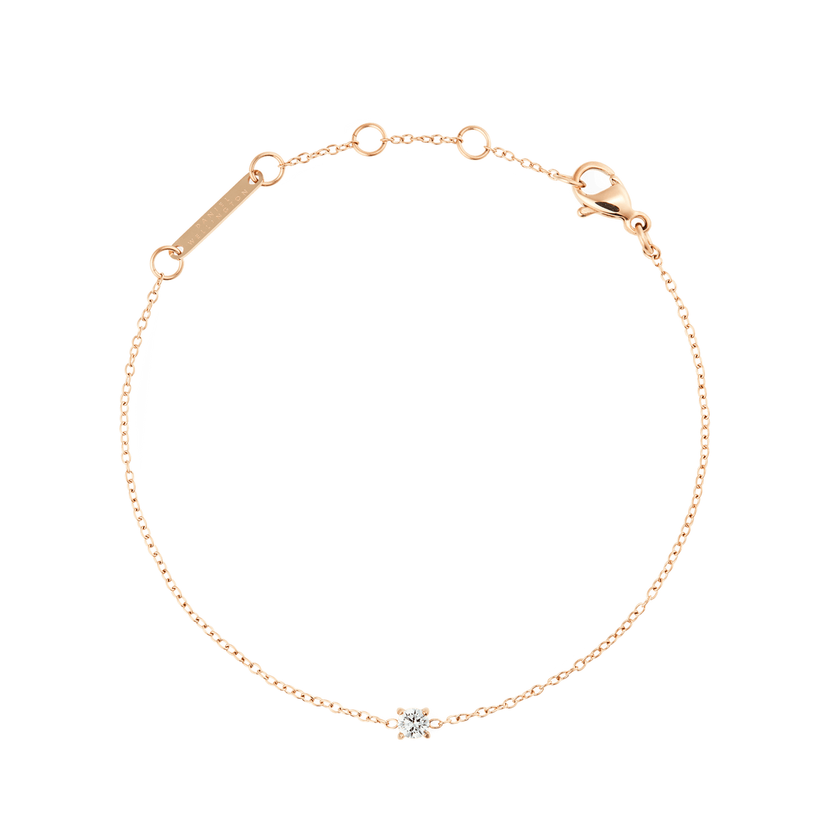 Delicate rose gold bracelet with a fine adjustable chain, featuring a single white cubic zirconia crystal in a minimal setting at the centre.