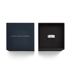Line Ring Brushed Silver 8mm presented in a sleek Daniel Wellington gift box, highlighting its wide brushed silver band and minimalist design, ideal for gifting or adding to your jewellery collection.