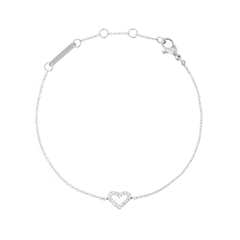 Slim silver bracelet with an open heart charm set with cubic zirconia stones, featuring an adjustable chain and secure clasp for comfortable everyday wear.