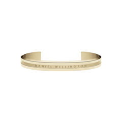 Slim gold cuff bracelet with a minimalist design, featuring engraved Daniel Wellington branding and a polished finish suitable for everyday wear or special occasions.