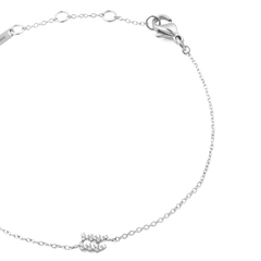 Crystal Zodiac Chain Bracelet Silver featuring a fine adjustable chain, secure lobster clasp, and a crystal-encrusted zodiac charm for a subtle, elegant finish.
