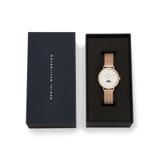 Petite Lune Melrose rose gold ladies watch with mesh strap and moon-phase sub-dial, presented in a branded Daniel Wellington gift box, ideal for gifting or special occasions.