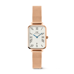 Rose gold ladies watch with a rectangular case, white dial featuring Roman numerals, blue hands, date display at 6 o’clock, and a mesh strap, ideal for everyday elegance and versatility.