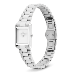 Daniel Wellington Bound Mini 3-Link Silver watch featuring a petite rectangular case, minimalist white dial, and slim 3-link stainless steel bracelet with a butterfly clasp, shown from a side angle to highlight its adjustable and comfortable fit.