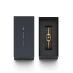 Quadro Mini Evergold Amber gold watch is elegantly presented in a Daniel Wellington gift box, featuring a petite rectangular dial and slim gold mesh strap, ideal for women who value timeless style.