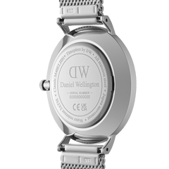 Close-up of the Classic Multi-Eye Sterling Onyx men's watch case back, showing engraved branding, stainless steel construction, water resistance details, and the silver mesh strap attachment.