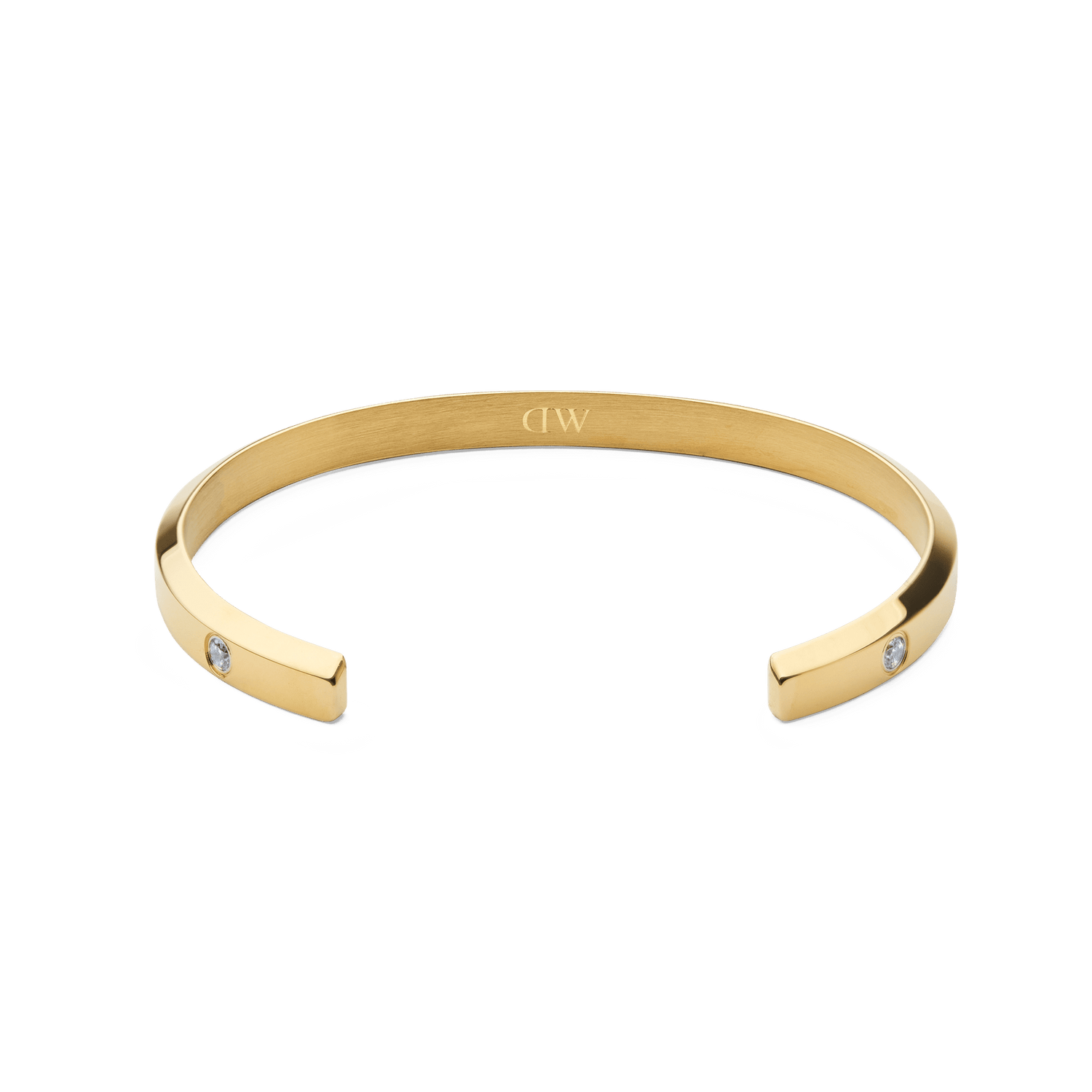 Classic Lumine Bracelet Gold 55mm featuring a minimalist open cuff design, polished gold finish, and sparkling cubic zirconia stones set at each end for a subtle, elegant look.