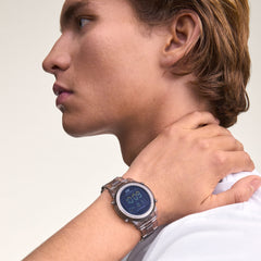Retro Digital Light Grey Light Grey watch with a transparent light grey strap and round digital face, worn on the wrist with a casual white shirt, highlighting its modern and versatile style.