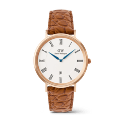 Classic men’s watch with a rose gold case, crisp white dial featuring black Roman numerals, blue hands, a date window at six o’clock, and a light brown croc-embossed leather strap.