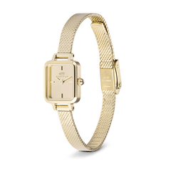 Quadro Mini Reflection Gold showcases a slim rectangular gold case with a mirror-effect dial and an adjustable gold mesh strap, designed for a comfortable and elegant fit on petite wrists.
