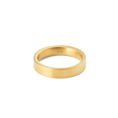 Line Ring Brushed Gold 4.5mm displays a sleek, matte gold band with minimalist lines and a subtle interior logo, ideal for both men and women seeking a refined everyday accessory.