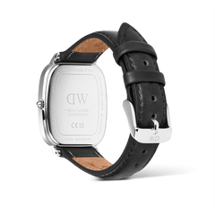 Back view of the Marlon Sheffield Linen Silver men's watch, showing the stainless steel case, engraved caseback, and adjustable black leather strap with a polished pin buckle.