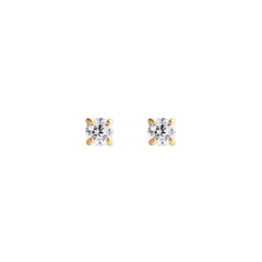 A pair of Mirelle Solitaire Stud Earrings in gold, each featuring a petite white cubic zirconia crystal set in a classic four-prong gold setting, shown against a plain background.