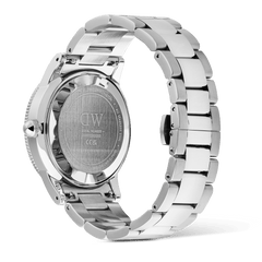 Rear view of the Daniel Wellington Iconic GMT Link Black Blue Ceramic Bezel Silver watch, showing the engraved stainless steel case back and the polished silver stainless steel bracelet with butterfly clasp.