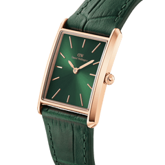 Bound Crocodile Emerald Sunray Rose Gold watch featuring a rectangular rose gold case, emerald green sunray dial, and crocodile-embossed leather strap, shown in a close-up angled view highlighting its premium finish and minimalist design.