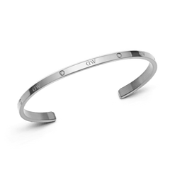 Classic Lumine Bracelet S shown as a slim, open silver cuff with six sparkling crystals and a polished finish, designed for comfortable stacking and everyday elegance.