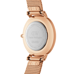 Back view of the Petite Roman Numerals Melrose ladies watch, showing the engraved case back, rose gold mesh strap, and secure clasp detail.