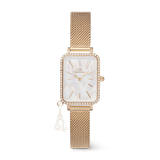 Quadro Crystal Zodiac Evergold gold watch for women with a slim rectangular case, crystal-framed bezel, mother of pearl dial, and a gold mesh strap featuring an interchangeable zodiac charm.