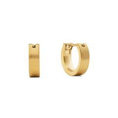 A pair of small brushed gold hoop earrings with a minimalist, softly textured finish and a secure latch-back closure, shown from both side and front angles against a plain background.