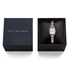 Quadro Mini Arch 3-Link Two Tone Rose Gold ladies watch presented in a Daniel Wellington gift box, featuring a slim rectangular case and a polished silver and rose gold 3-link bracelet.