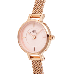 Rose gold Petite Mini Blush Melrose watch with a blush pink sunray dial, slim mesh strap and minimalist hour markers, showcasing its refined and elegant design.