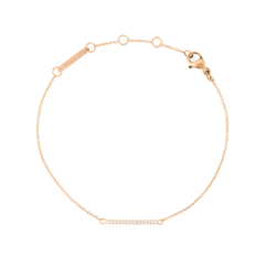 Delicate Mirelle Eternity Bracelet Rose Gold featuring a slim rose gold chain and a bar set with white cubic zirconia crystals, shown with an adjustable clasp for versatile styling.
