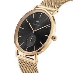 Classic Multi-Eye Evergold Onyx men's watch with a black multi-eye dial, gold hour markers, and a gold mesh strap, shown in a close-up angle highlighting its minimalist design and polished PVD gold finish.