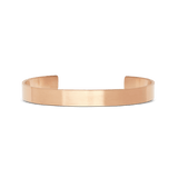 Minimalist Line Cuff Brushed Rose Gold bracelet with a brushed rose gold finish, featuring a slim open cuff design crafted from stainless steel, shown against a plain background.