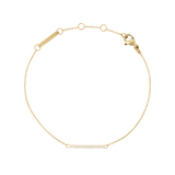 Slim gold Mirelle Eternity Bracelet featuring a fine adjustable chain and a delicate bar set with sparkling white cubic zirconia stones, designed for a subtle and elegant look.