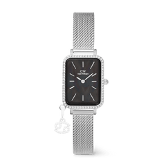 Rectangular silver women’s watch with a black mother of pearl dial, crystal-set bezel, silver mesh strap, and a removable zodiac charm, blending elegant design with a touch of personalisation.