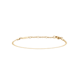 Flat Chain Bracelet G featuring a slim, twisted gold chain with adjustable links and a secure clasp, crafted from stainless steel with gold PVD plating for a refined, minimalist look.