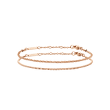 Two rose gold bracelets from the Staple Bracelet Set RG, featuring delicate chain designs with adjustable clasps and a polished finish, ideal for layering or wearing individually.