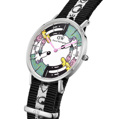 Steven Harrington x Daniel Wellington limited edition watch with a silver case, vibrant multicolour printed dial, and black and white illustrated NATO strap, highlighting playful artistic details.