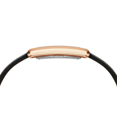 Side profile of the Bound Black Crocodile Rose Gold watch, highlighting its slim rose gold rectangular case and black leather strap for a sleek, comfortable fit.